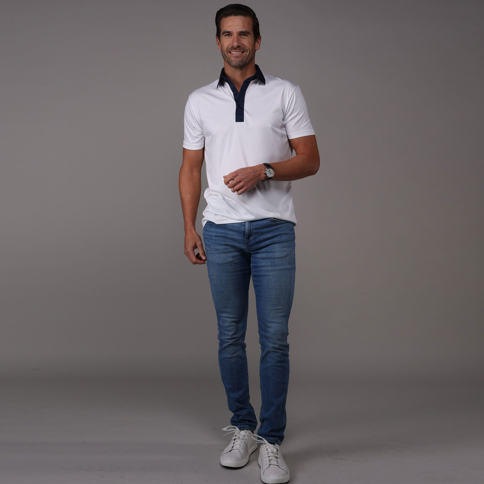 White polo shirt and blue clearance jeans